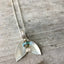 Upcycled Spoon Necklace in the shape of a mermaid tail