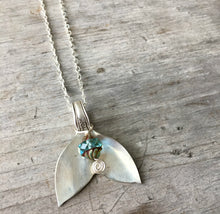 Upcycled Spoon Necklace in the shape of a mermaid tail