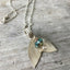 Vintage silverplate silverware necklace in the shape of an ocean creature tail fin