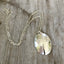 Handmade one of a kind spoon necklace shaped like a ladybug