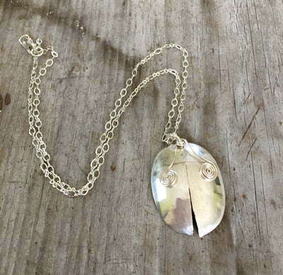 Handmade one of a kind spoon necklace shaped like a ladybug