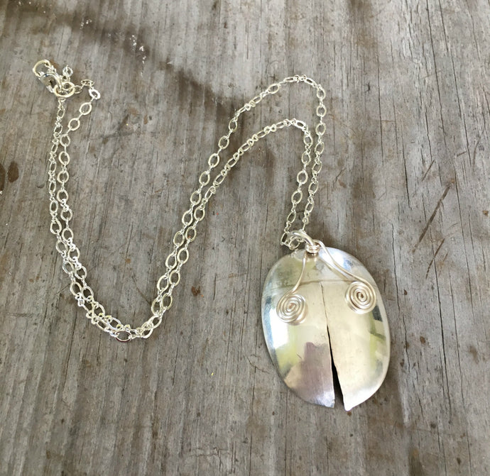 Handmade one of a kind spoon necklace shaped like a ladybug