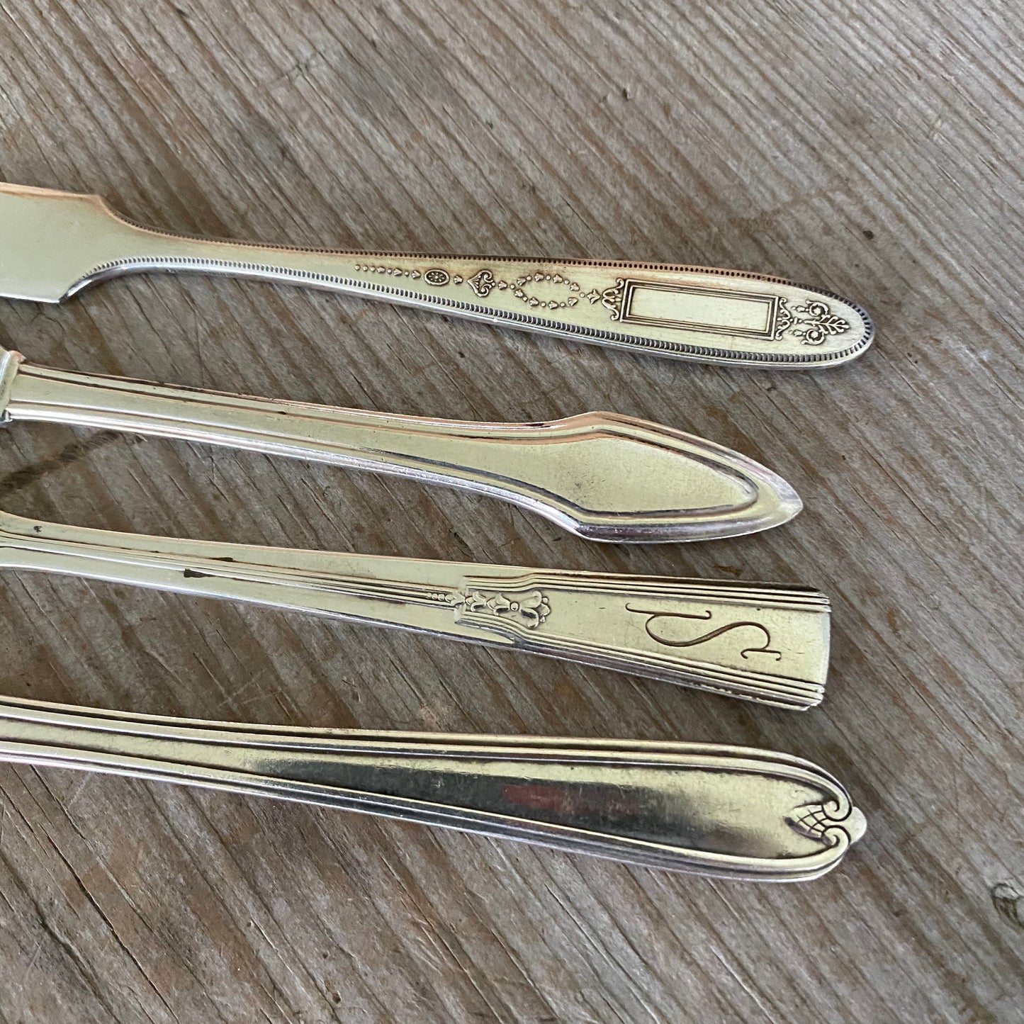 Close up of handles on Repurposed vintage spreaders with Spread Cheer lettering - thoughtful seasonal hostess gifts