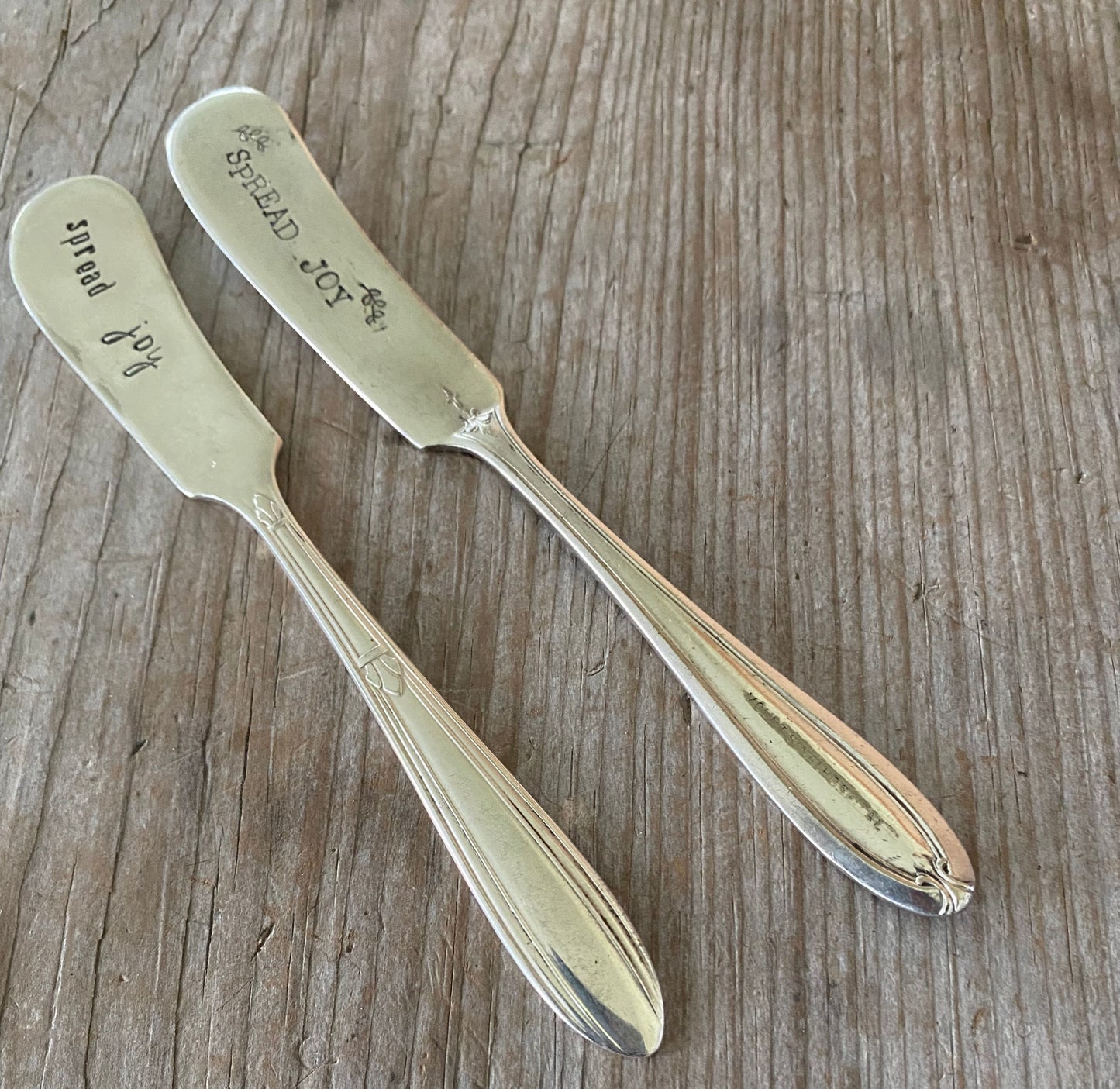 Transformed vintage silverware featuring Spread Joy hand stamping - perfect for entertaining