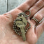 Hand Stamped Upcycled Key Necklace WILD CHILD with vintage ball chain shown in hand for scale