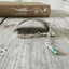 View of curve on stamped spoon bracelet about creativity