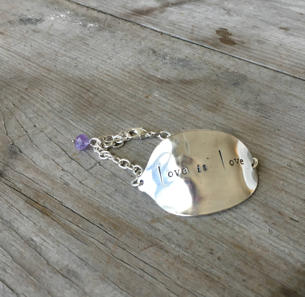 Stamped Spoon Bracelet Love is Love with lavendar glass bead