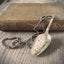 Stamped spoon necklace in convex shape