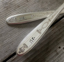 Closeup of the Mr. Mr. Stamping on vintage silverplate wedding cake forks