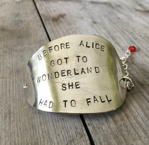 upcycled spoon handmade bracelet stamped with before alice got to wonderland she had to fall