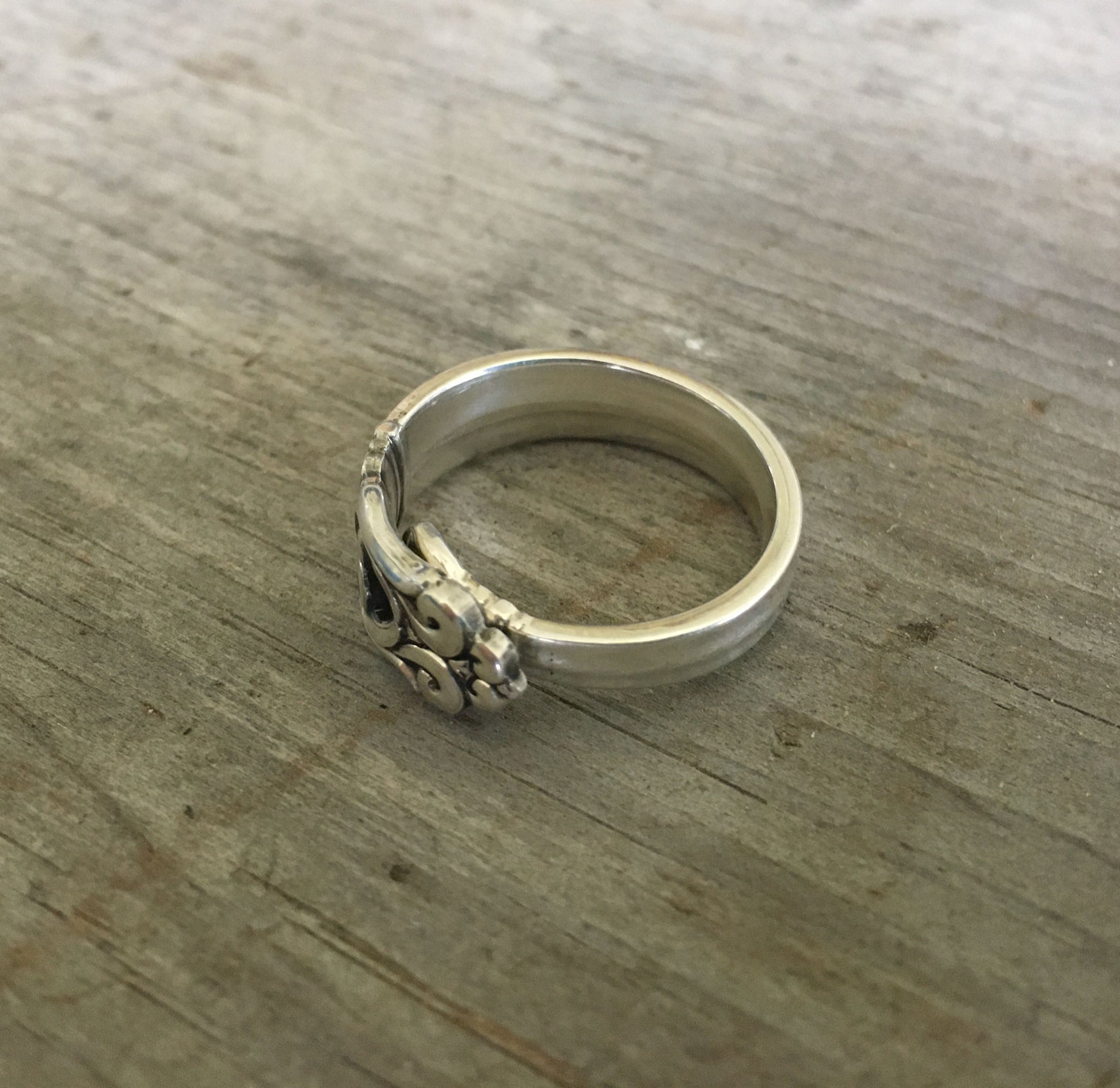 Top view of 1939 International Silver Royal Danish demitasse spoon transformed into artisan sterling ring - Sterling spoon ring - handcrafted from upcycled vintage silverware - Laughing Frog Studio