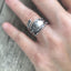 Josephine pattern sterling silver coil wrap spoon ring worn on model's hand - Sterling spoon ring - handcrafted from upcycled vintage silverware - Laughing Frog Studio