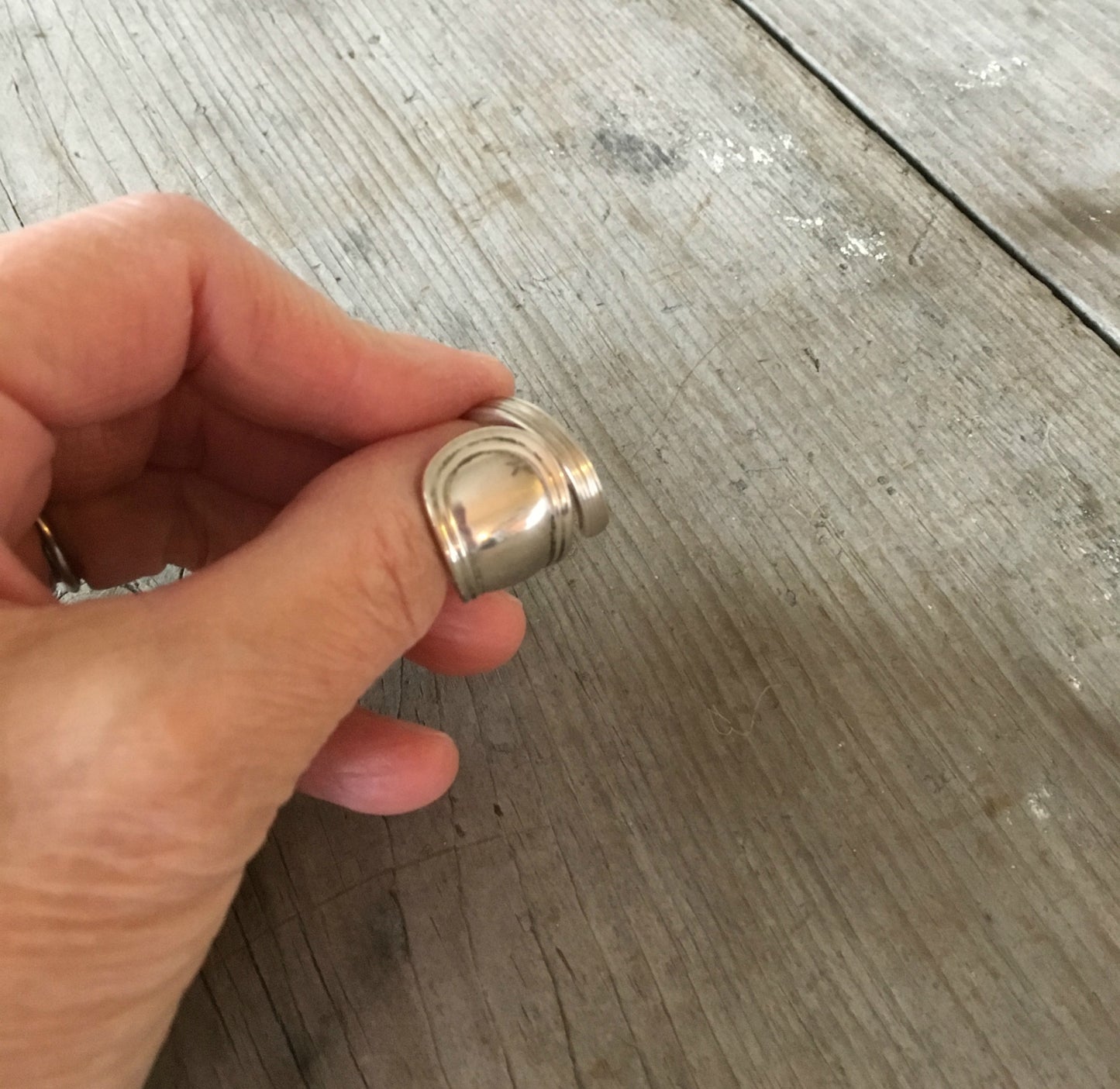 Sterling silver spoon ring close up