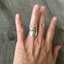 Sterling silver spoon ring in coil wrap design shown on model's hand