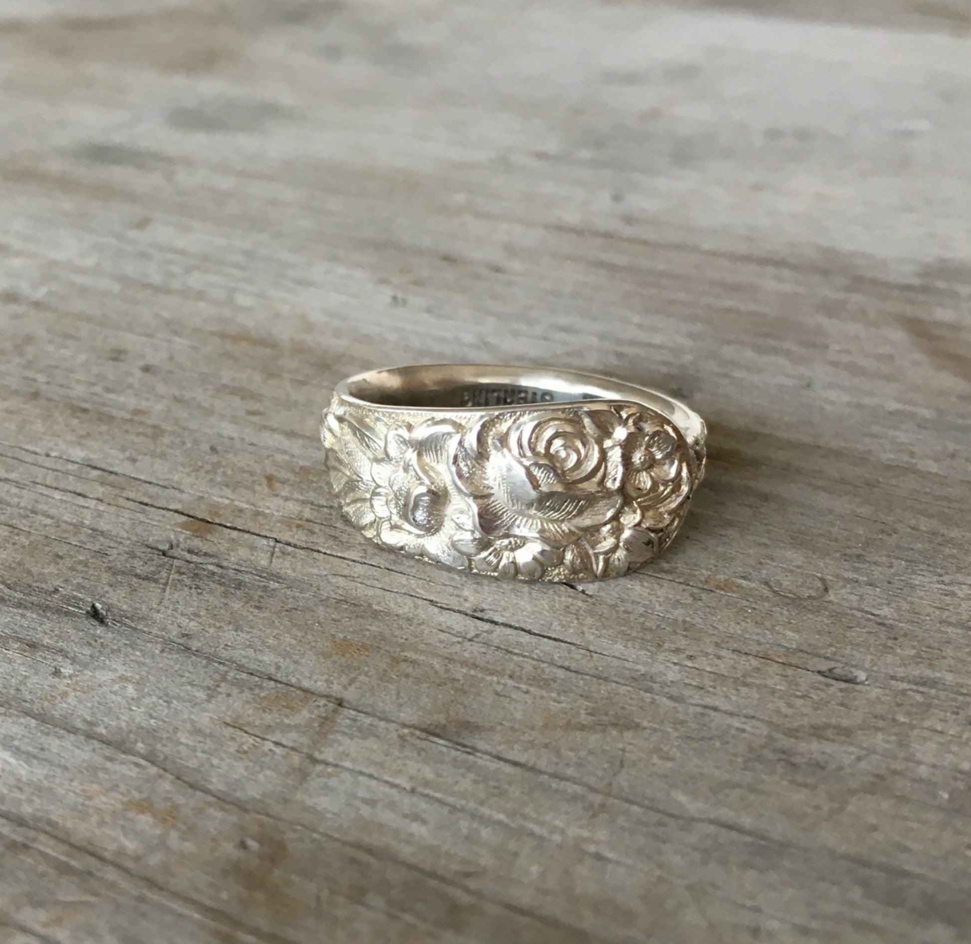 Kirk & Son Repoussé sterling silver demitasse spoon ring with dramatic deeply textured floral design