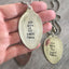 THE LAKE IS MY HAPPY PLACE spoon necklace held in hand for scale one-of-a-kind gift for lake friend