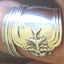 Close-up of tiered botanical motif on Whiting Duchess pattern sterling silver spoon ring - Sterling spoon ring - handcrafted from upcycled vintage silverware - Laughing Frog Studio