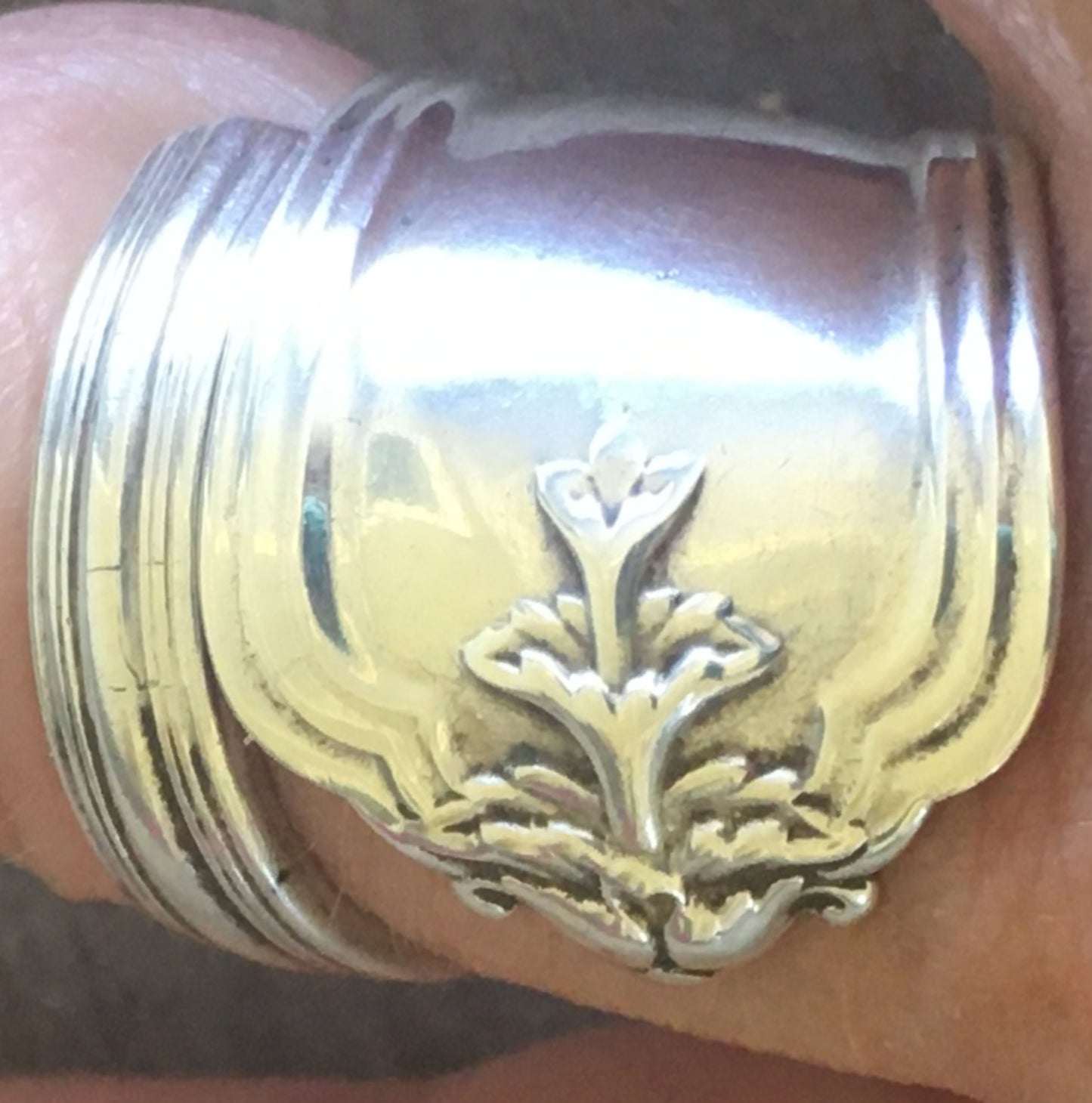 Close-up of tiered botanical motif on Whiting Duchess pattern sterling silver spoon ring - Sterling spoon ring - handcrafted from upcycled vintage silverware - Laughing Frog Studio