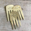 Collection of upcycled fork bookmarks including BOOK DRUNKARD and other literary designs