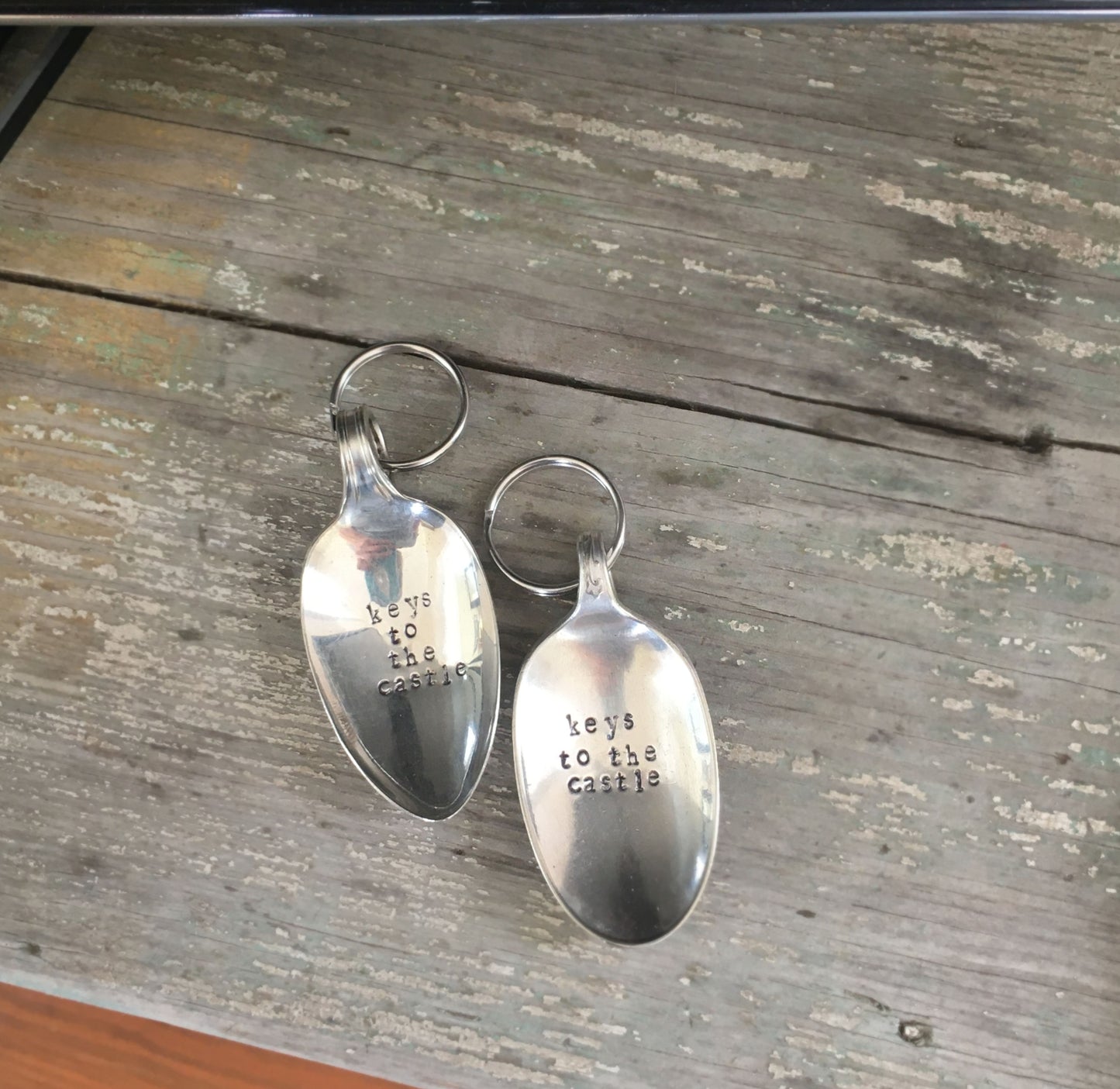 Pair of Keys To The Castle hand-stamped spoon keychains handcrafted from upcycled vintage silverware home gift