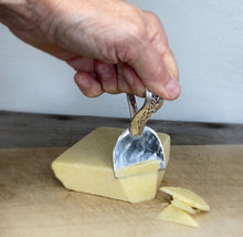 Demonstration view ergonomic cheese knife made from an upcycled vintage spoon