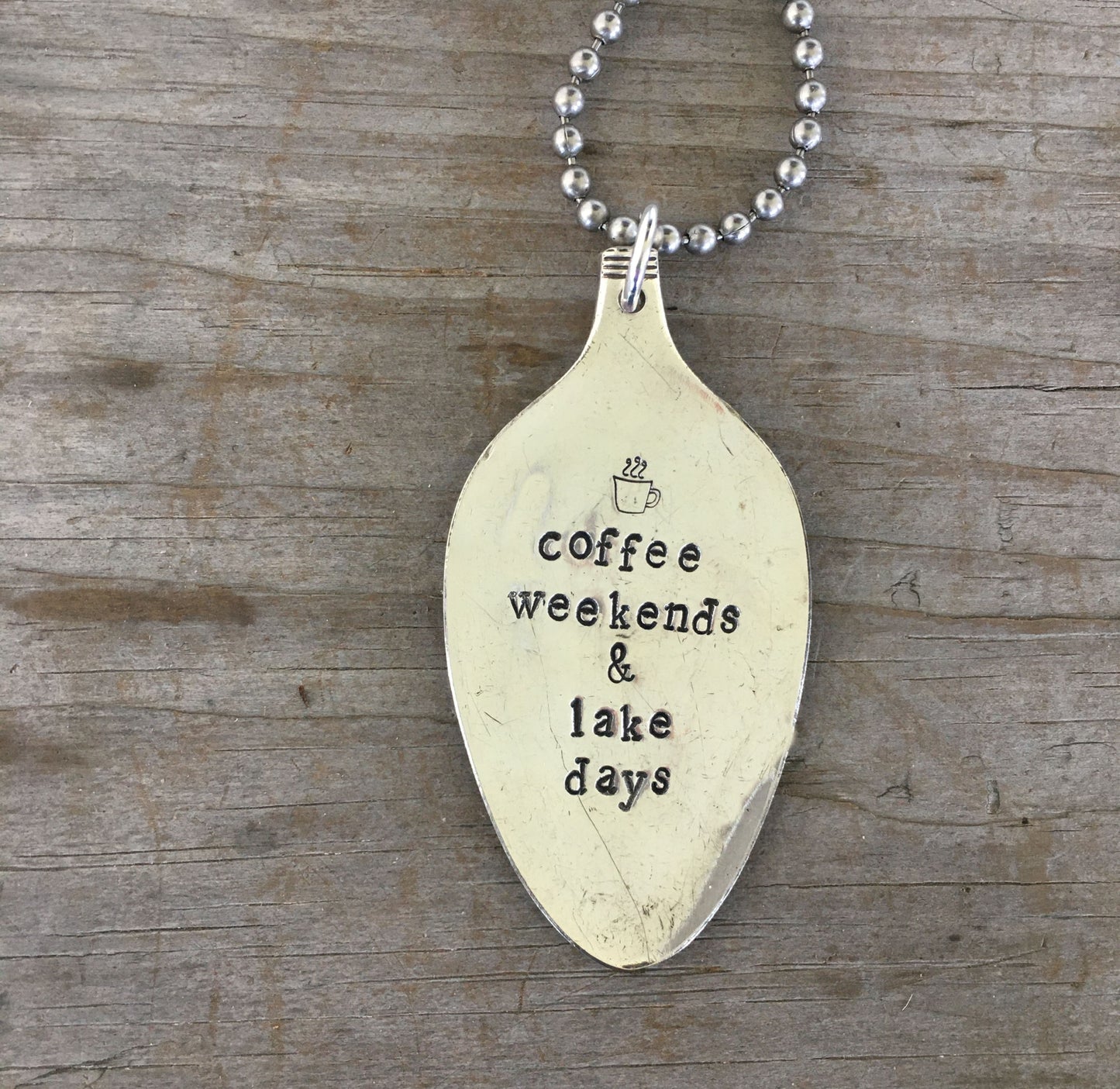 Detail of COFFEE WEEKENDS & LAKE DAYS stamped spoon pendant on vintage ball chain summer jewelry