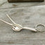 Fork Keychain bent to look like the hand gesture for the symbol of peace